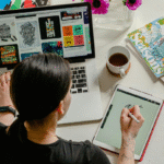 Novice designer woman working at front of laptop.