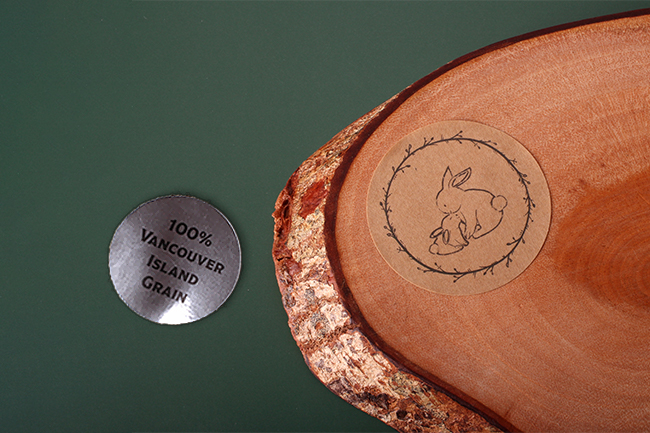 A metallic finish and a kraft paper sticker, showing the difference between vinyl or paper stickers.