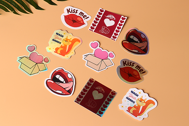 A collection of various custom stickers in different shapes and finishes.
