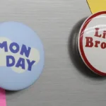 Die-cut stickers and round magnets used on a metal surface next to to-do lists.
