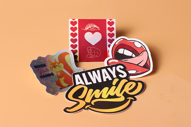 Assorted waterproof sticker designs including a squirrel, lips, and "Always Smile" text.