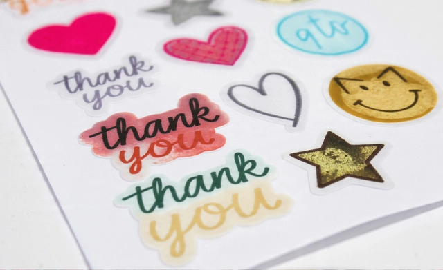 A sheet of custom "thank you" stickers for customer packaging.