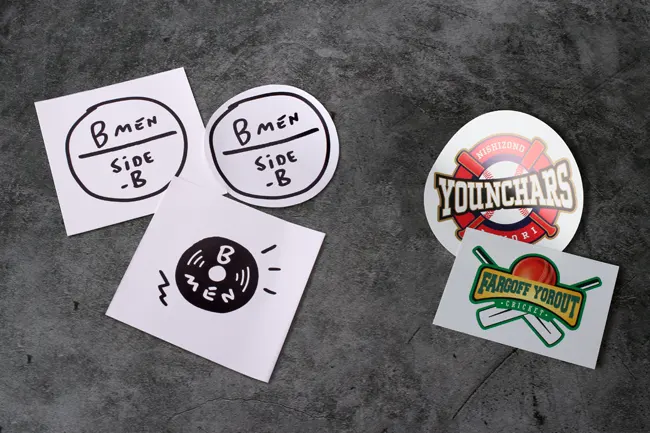 Comparison showing the physical differences between kiss cut and die cut stickers.