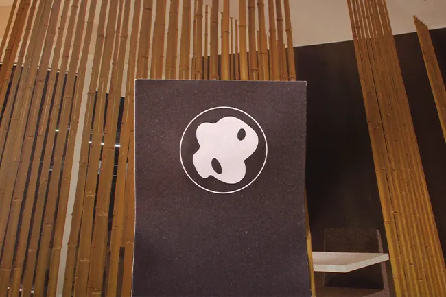 A minimalist paper sticker which is a type you might need to remove sticker from books.