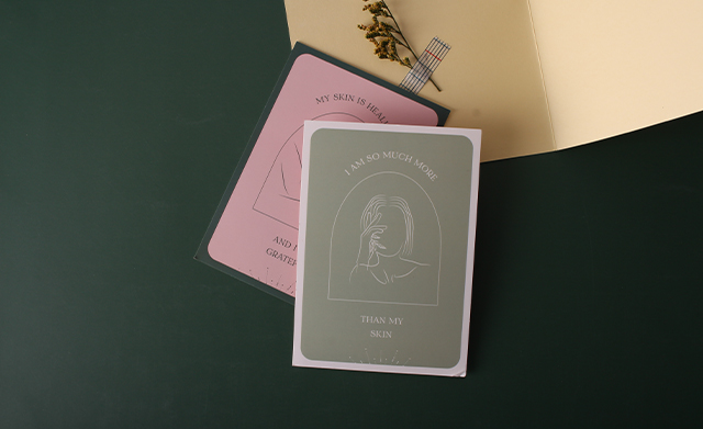 Stacked greeting cards showing how overlapping layers guide reading patterns.